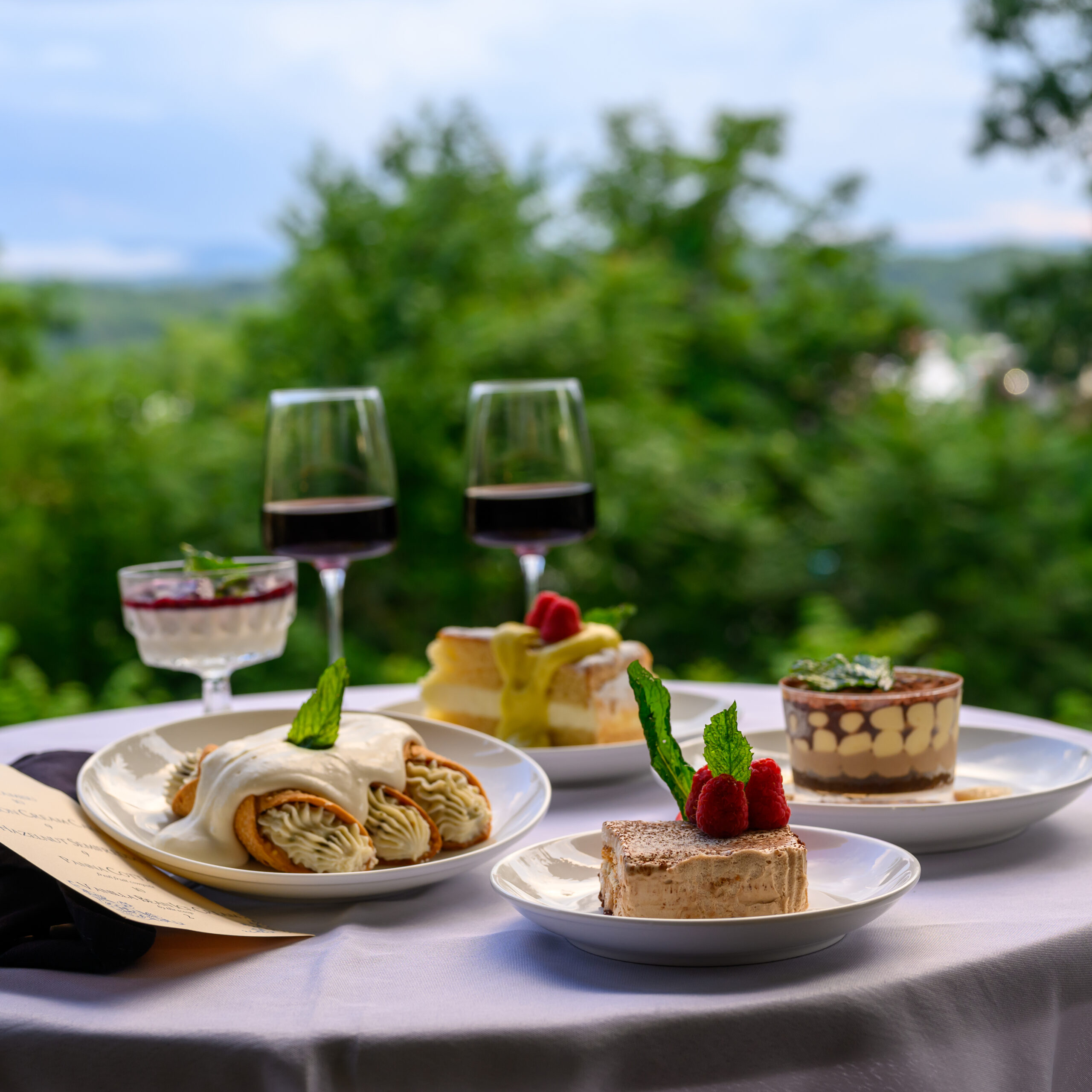 Food and wine on the patio at Graceland Inn